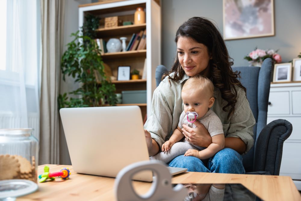 mom and baby on computer